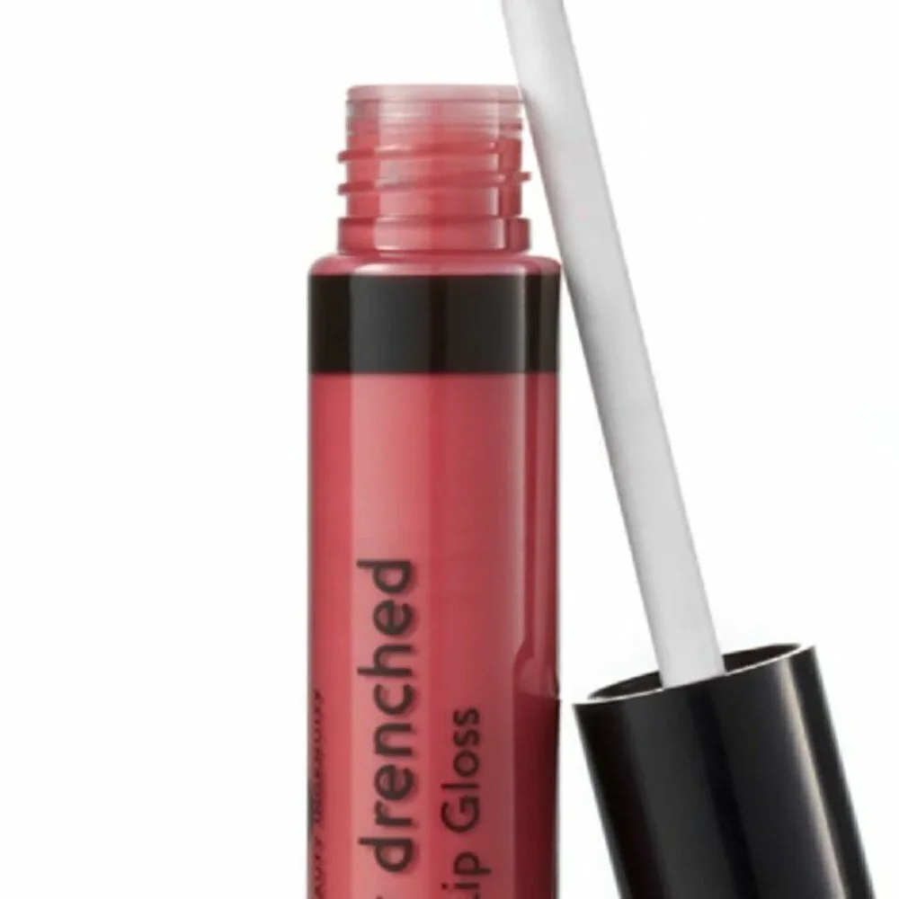 Laura Geller Color Drenched Lip Gloss in Perked Up Pink: a smooth rosy p…